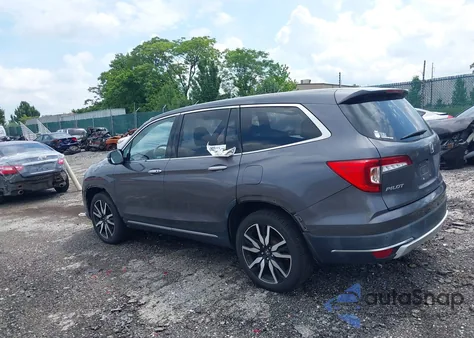 2019 Honda Pilot Touring z USA, uszkodzony, nr VIN 5FNYF6H61KB067739